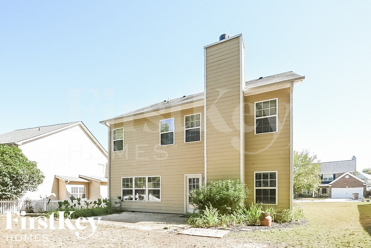 Foto del edificio - 7023 Grand Hickory Dr