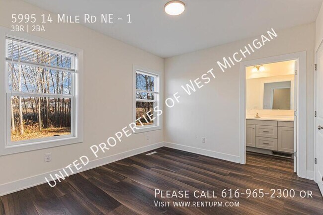 Foto del edificio - 5995 14 Mile Rd NE