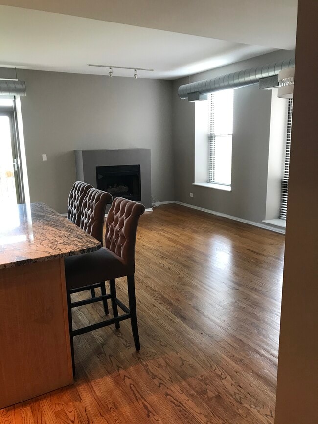 Great- room with a gas fireplace firer place - 811 S Lytle St