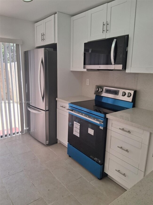 Building Photo - 10029 SW 77th Ct