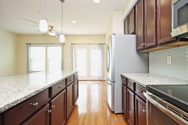 Building Photo - Pet-Friendly Townhome Minutes From NGIC, C...