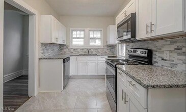 Building Photo - 12980 Cedar Rd