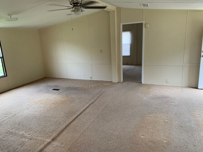 Building Photo - Doublewide Mobile Home on Large Corner Lot