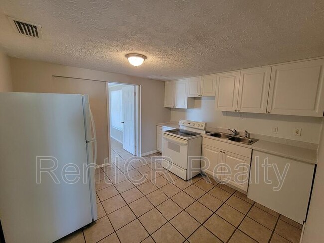 Building Photo - 7408 Sea Grape Ave