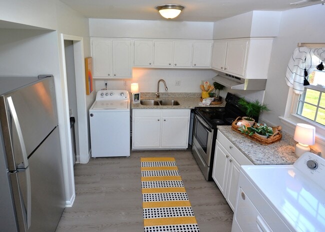 Kitchen in newly renovated Townhome at Trails End Apartments in Burlington, NC - Trails End Apartments
