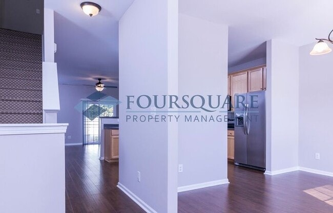 Building Photo - Townhome | Fenced-In Patio | Ceiling Fans|...