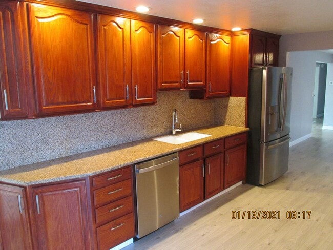 Building Photo - HUGE Bonus room ! Remodeled !  Hardwood Flooring Throughout & New Carpet in Bedrooms, Tile, Grani...