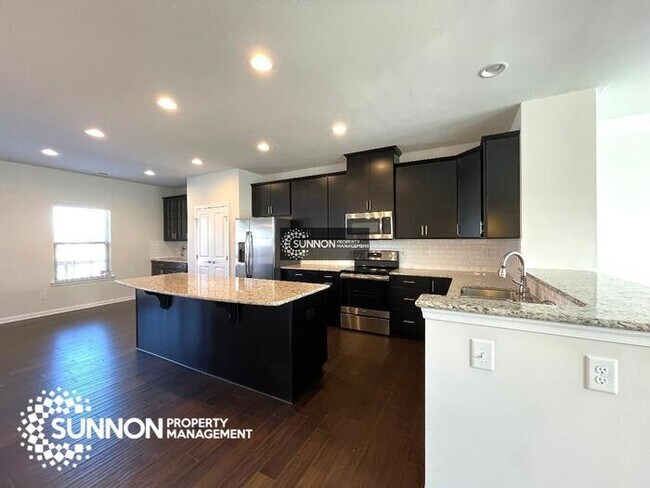Building Photo - Beautiful 3-story End Unit in City Park!