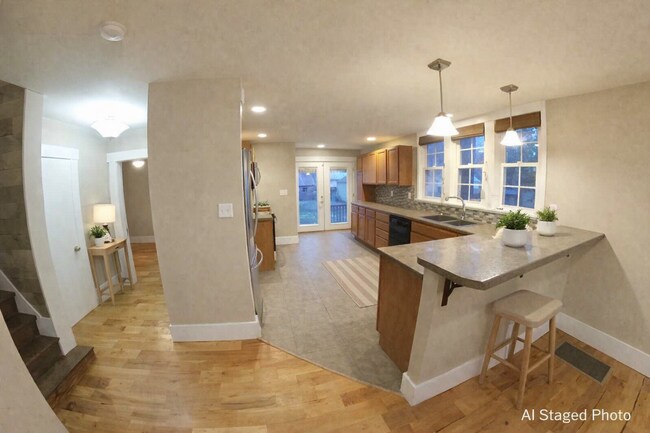 Building Photo - Huge Fenced-in Yard + Washer & Dryer Included + Beautiful Hardwood Floors! Available May 2nd!