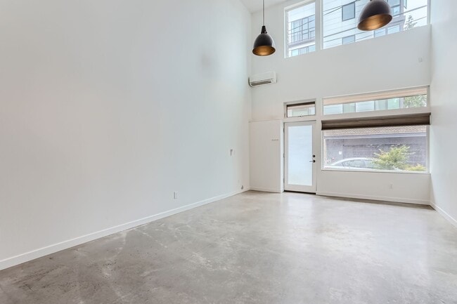 Building Photo - Luxurious 2-Bedroom Townhome with HUGE Multifunctional Space AND loft