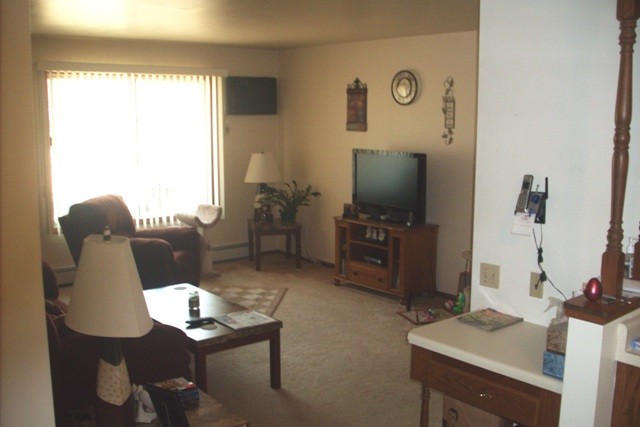 Sala de estar - Royal Oaks Apartments