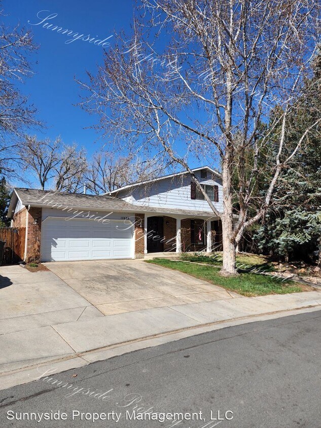 Primary Photo - 4 br, 2.5 bath House - 13855 W 68th Dr.