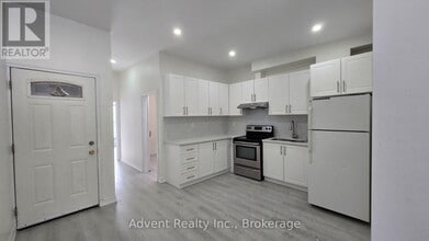 Building Photo - 1454 Queen St W