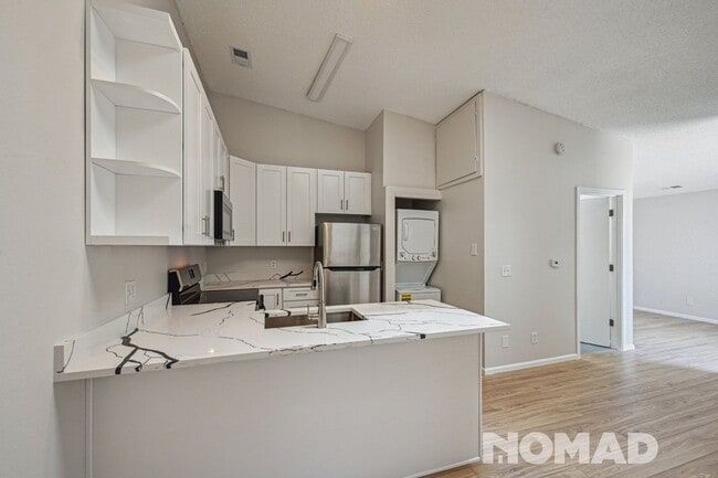 Building Photo - Charming 1BR Condo in Denver