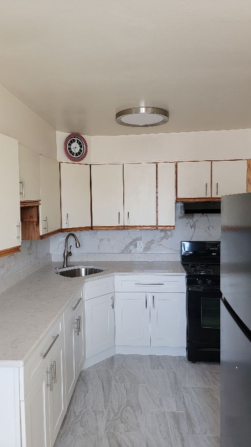 Foto del edificio - 7703 Woolston Ave