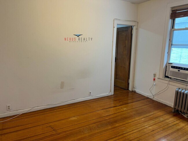 Building Photo - 25-66-66 42nd St