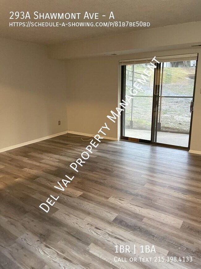 Foto del edificio - Enchanting 1-Bedroom End-Unit Condo in Rox...