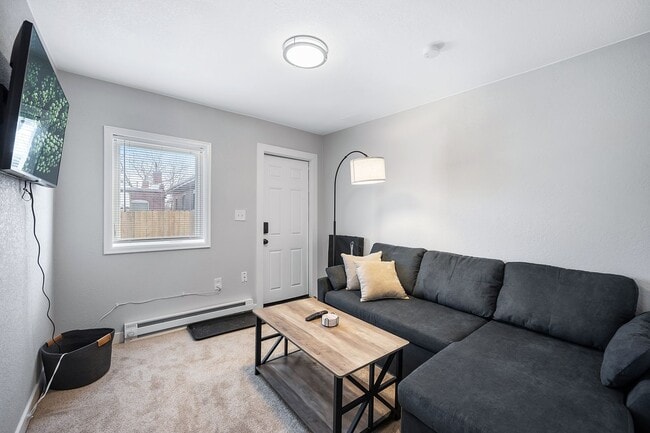 Building Photo - Remodeled and Furnished 1BD, 1BA in the Highlands with Off-Street Parking Spot
