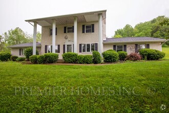 Building Photo - 1106 N Orchard Rd NE
