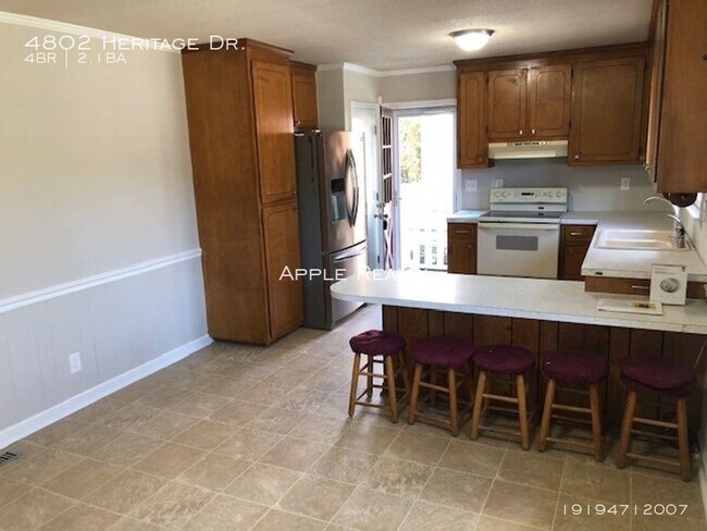 Building Photo - 4802 Heritage Dr - Available now