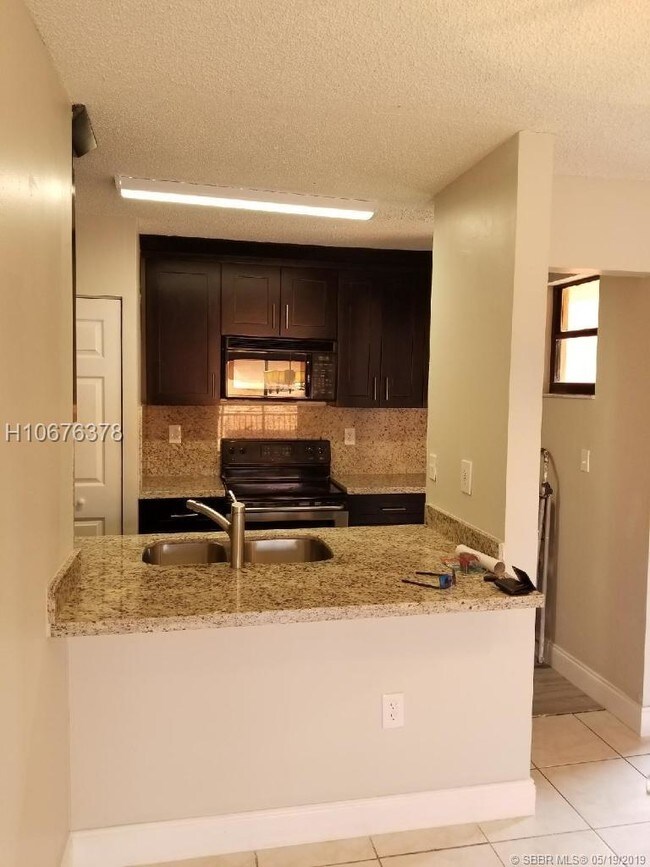 Building Photo - 6425 W 27th Ct