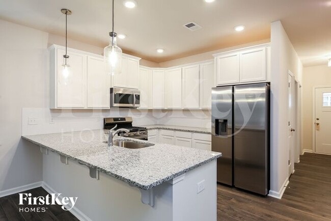 Building Photo - 104 Wild Lily Drive