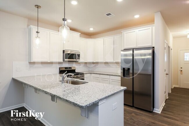 Foto del edificio - 104 Wild Lily Drive