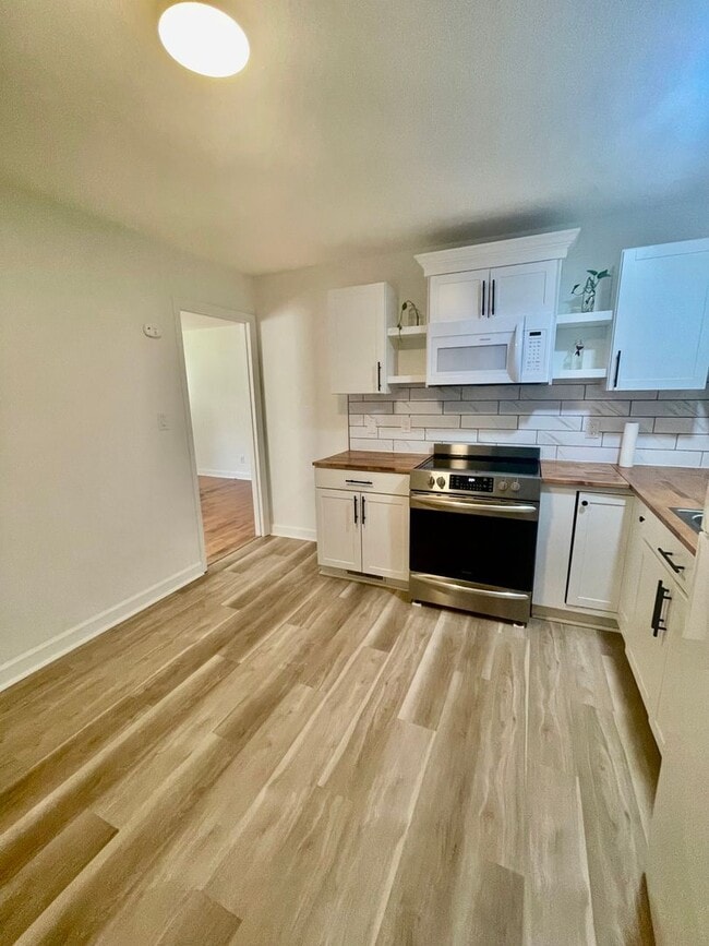 Building Photo - Newly renovated  3 bedroom 1 bath brick ranch home sitting on a large lot and on a quiet street i...