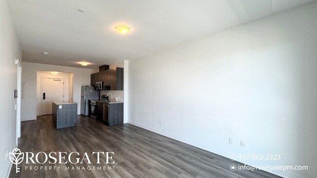 Photo du bâtiment - Modern 1+Den Condo in Milton – 695 Sq Ft w...