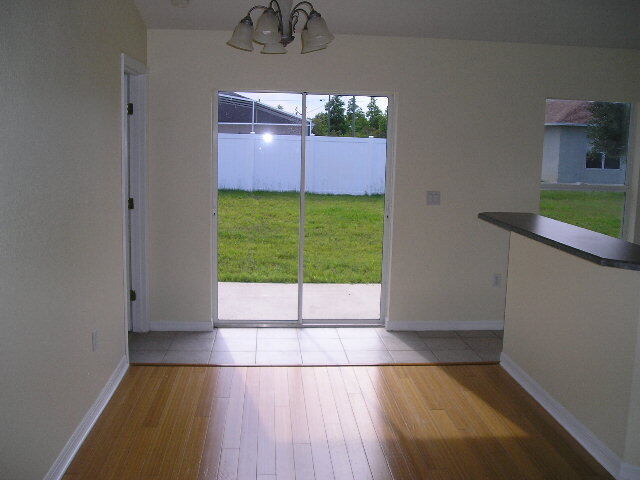 Foto del edificio - "Charming 3-Bedroom Haven with 2 Baths in Palm Coast – 1208 Sq Ft of Cozy Living!"