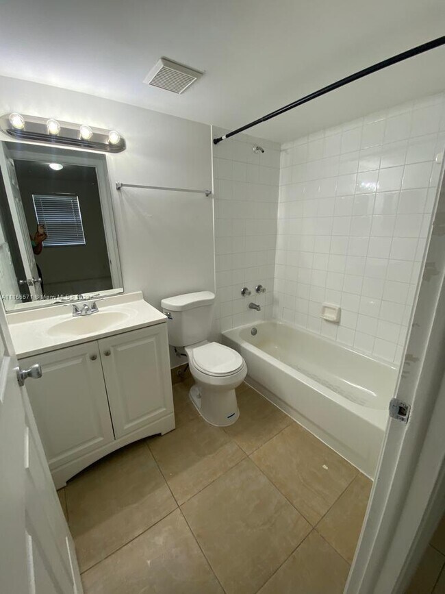 Building Photo - 2421 NW 56th Ave