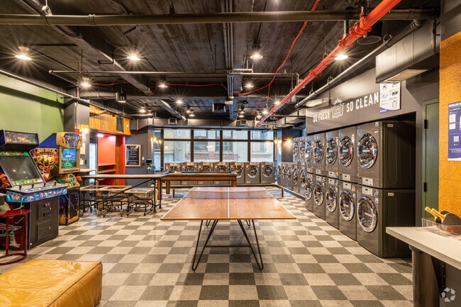 8th Floor Laundry - Placemakr Wall Street Apartments