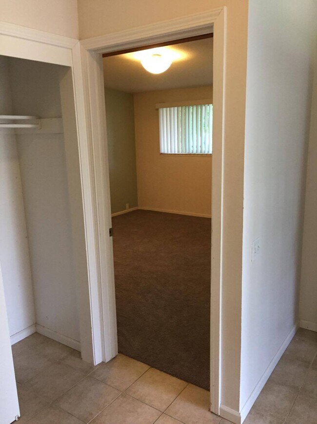 Master bedroom and front entry closet (next to front door). - 4401 Baron Ave