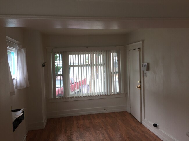 Window facing outside next to entrance door - 312 Cerritos Ave