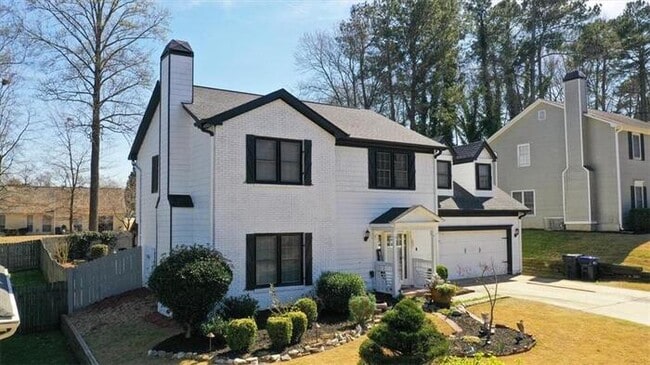 Building Photo - 4 bedroom house in Lawrenceville with cozy...