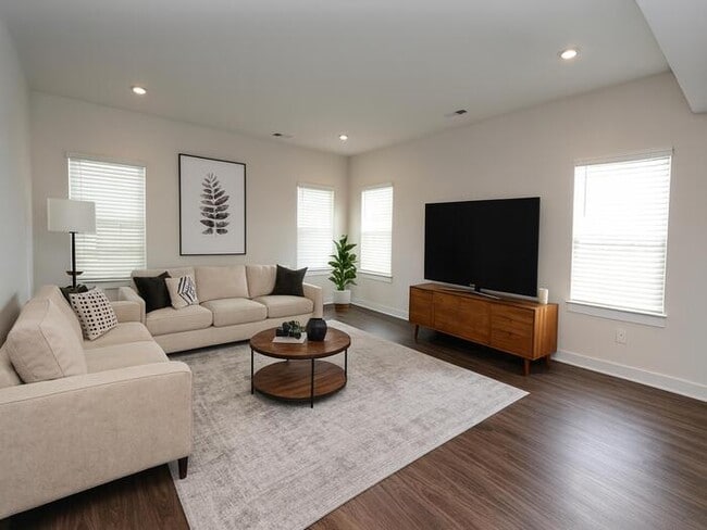 Building Photo - This wonderful home has a covered rocking chair front porch