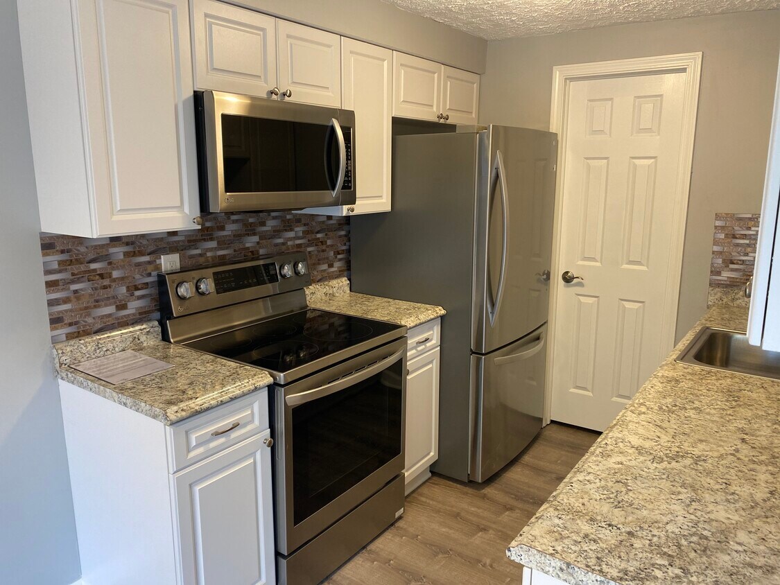 Brand New Kitchen. Stainless steel everything. Pantry. Brand new fridge. Electric stove - 2817 Conrad Dr