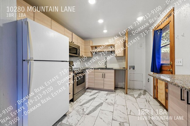 Photo - 10280 MOUNTAIN LANE- House