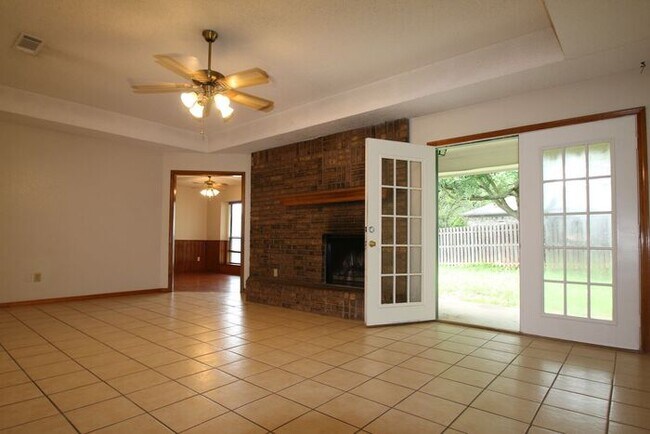 Building Photo - Corner Lot Charmer Off Chapel Creek | 4BR/2BA with Fireplace, Garden Tub & Fenced Backyard