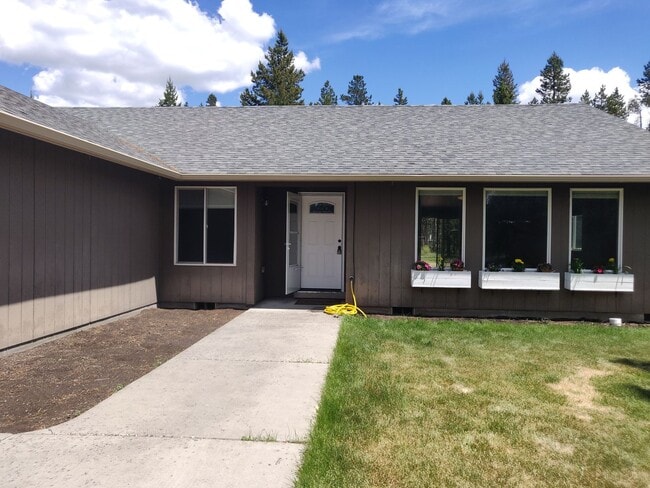 Building Photo - Charming 4-Bedroom Home on 1/2 Acre with a Fenced Backyard, Fully Insulated Double-Car Garage, in...