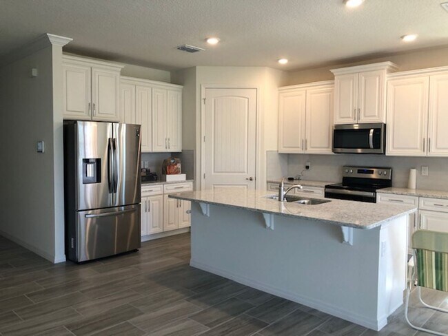 Building Photo - ALMOST NEW 4 BDRM home in GATED ROSECREST!