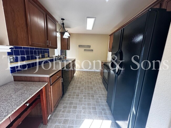 Building Photo - Spacious 3 Bedroom Home with Primary Suite on Main, Gas Fireplace & Patio in Advance!