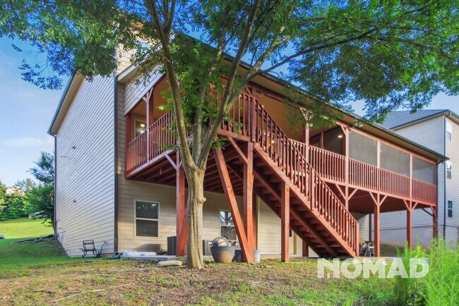 Foto del edificio - Stunning 6BR House in Cumming