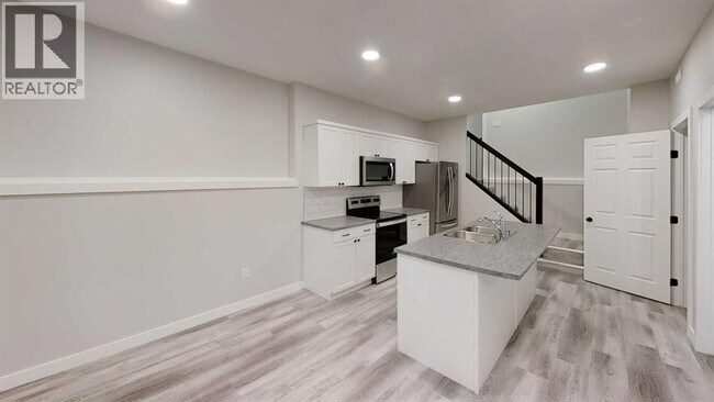 Photo du bâtiment - 13001-1104B 104B St