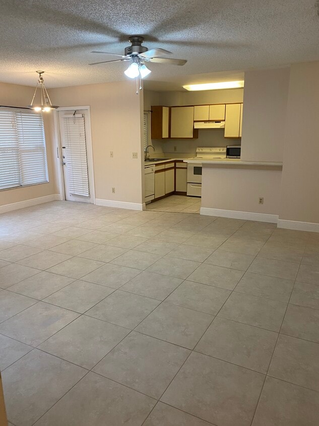 Living Room/Kitchen - 5460 E Michigan St (Orlando, FL)