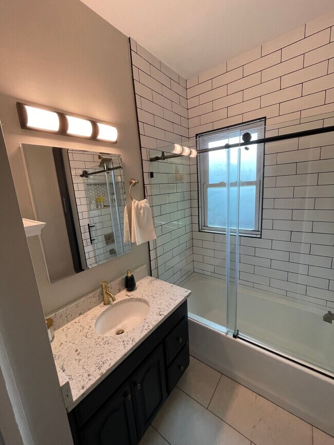 Renovated Bathroom and Shower - 704 Tremont Ave