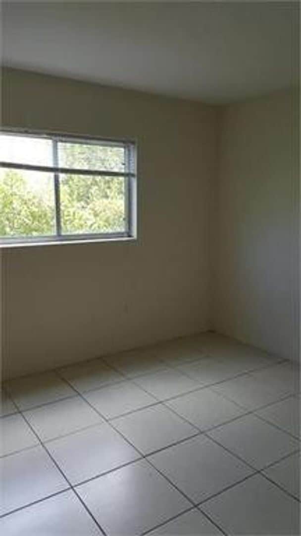 Building Photo - Newport Condominiums - 201