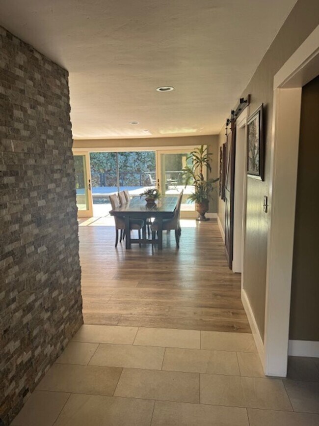 Building Photo - Stunning Deck and Pool for this Updated Mi...