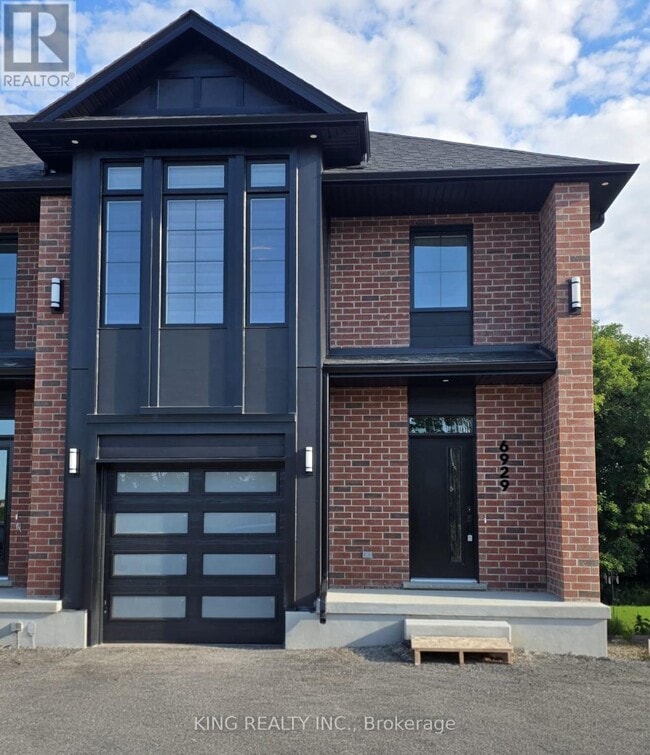 Building Photo - 6929 Heathwoods Ave
