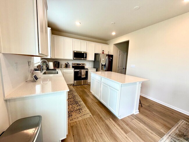 Building Photo - 1 Year Old Home Ready for You!
